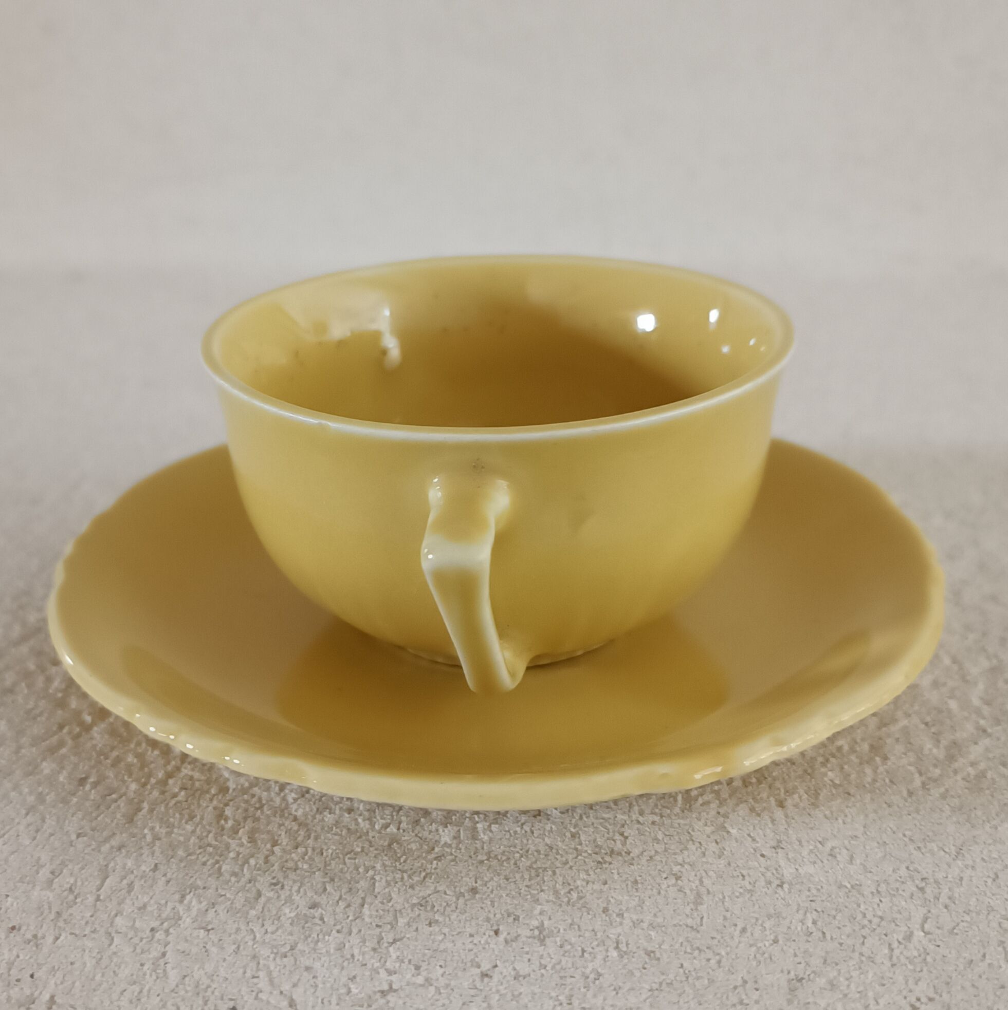 Earthenware cup and saucer 1940s-1950s