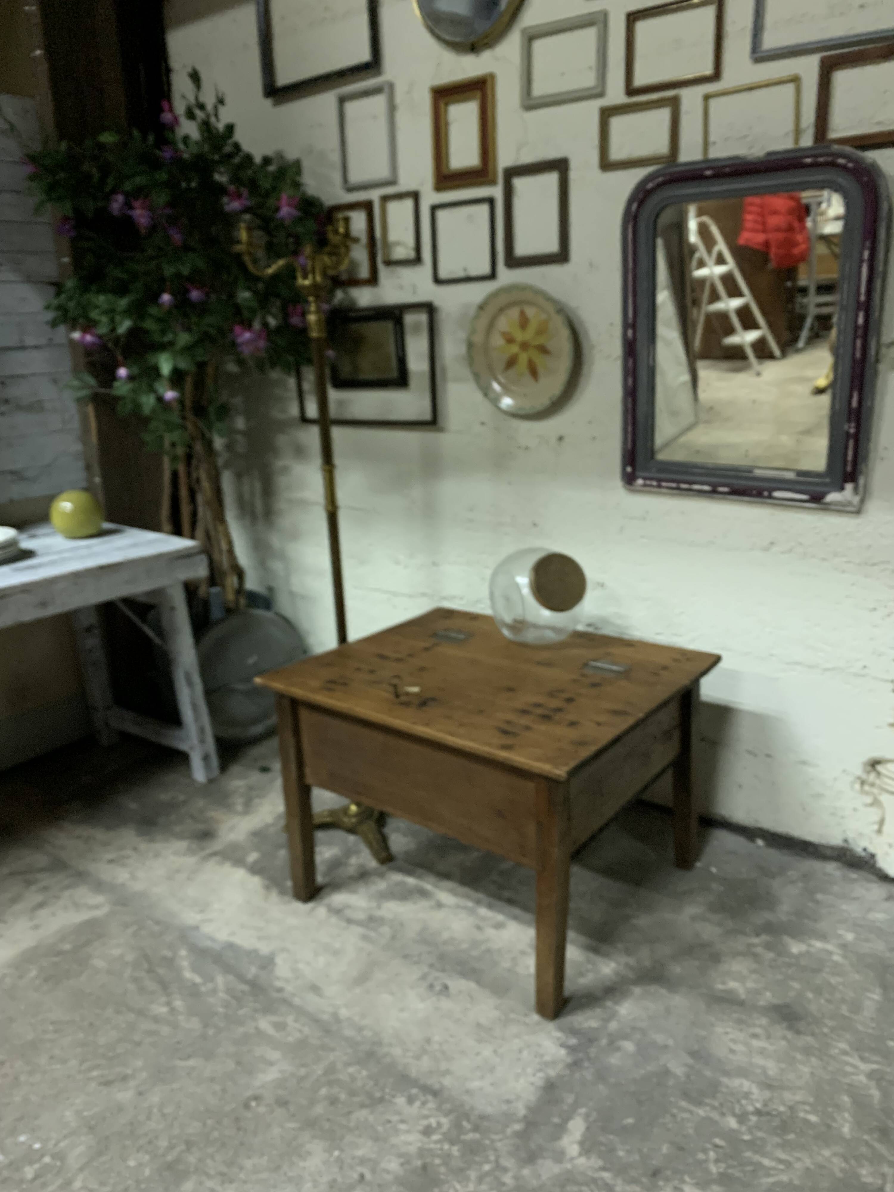 Coffee table with a key storage compartment.
