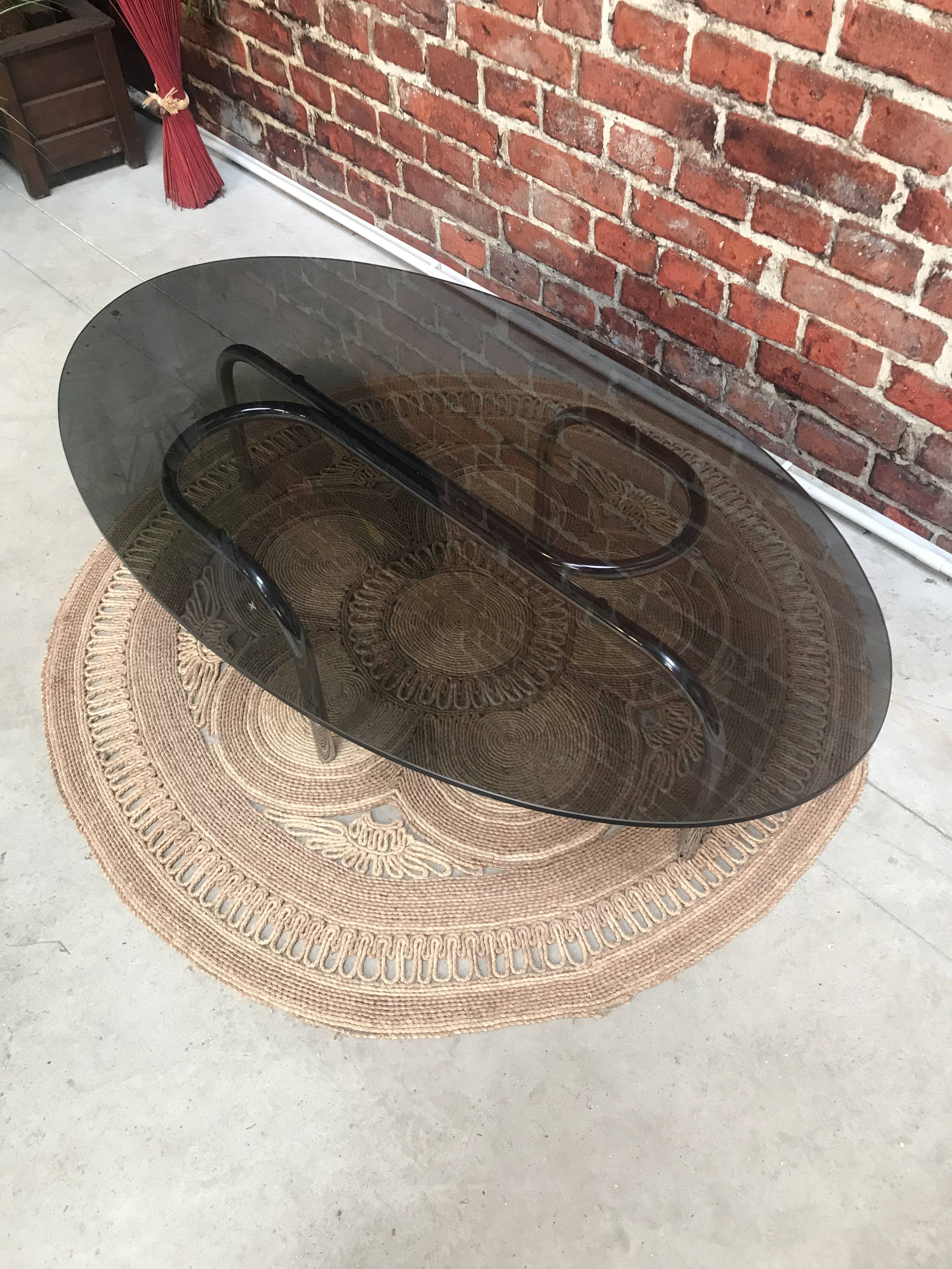 Vintage 70's oval coffee table in glass and chrome