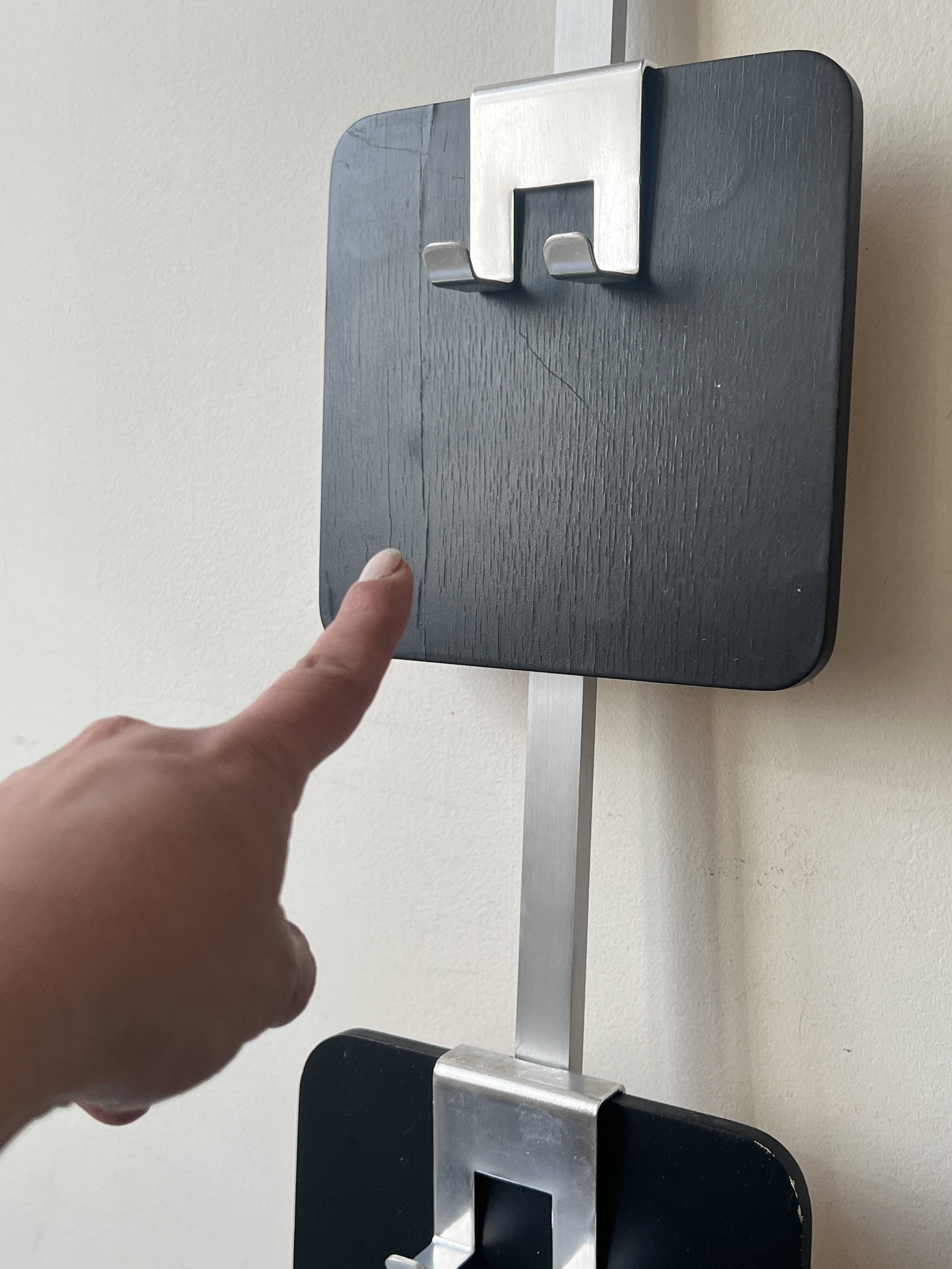 Large modernist wall coat rack in wood and metal, 1970s design.