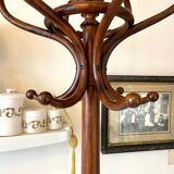 Parrot and dark arched beech coat rack