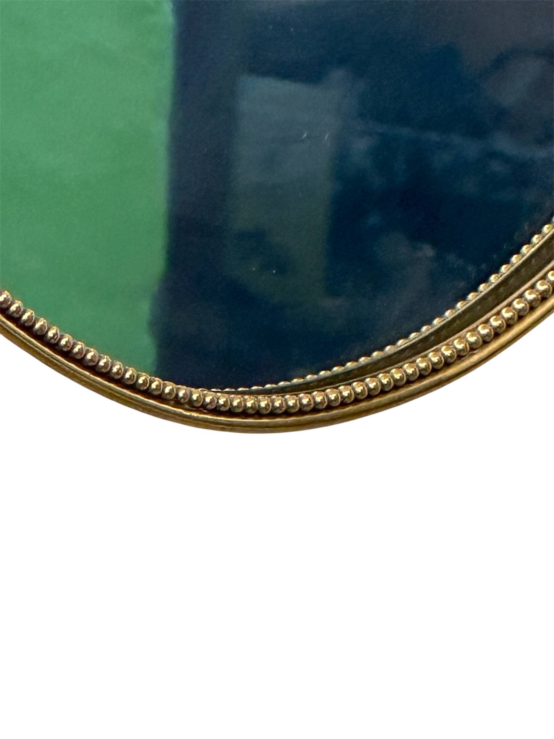 Italian 1940-50’s brass frame mirror.