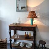 Enamelled ceramic lamp and rattan