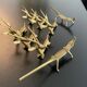 8 porte-couteaux forme antilope et crocodile en laiton