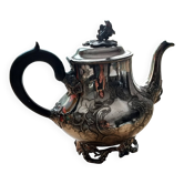 Teapot and sugar bowl in silver-plated metal.