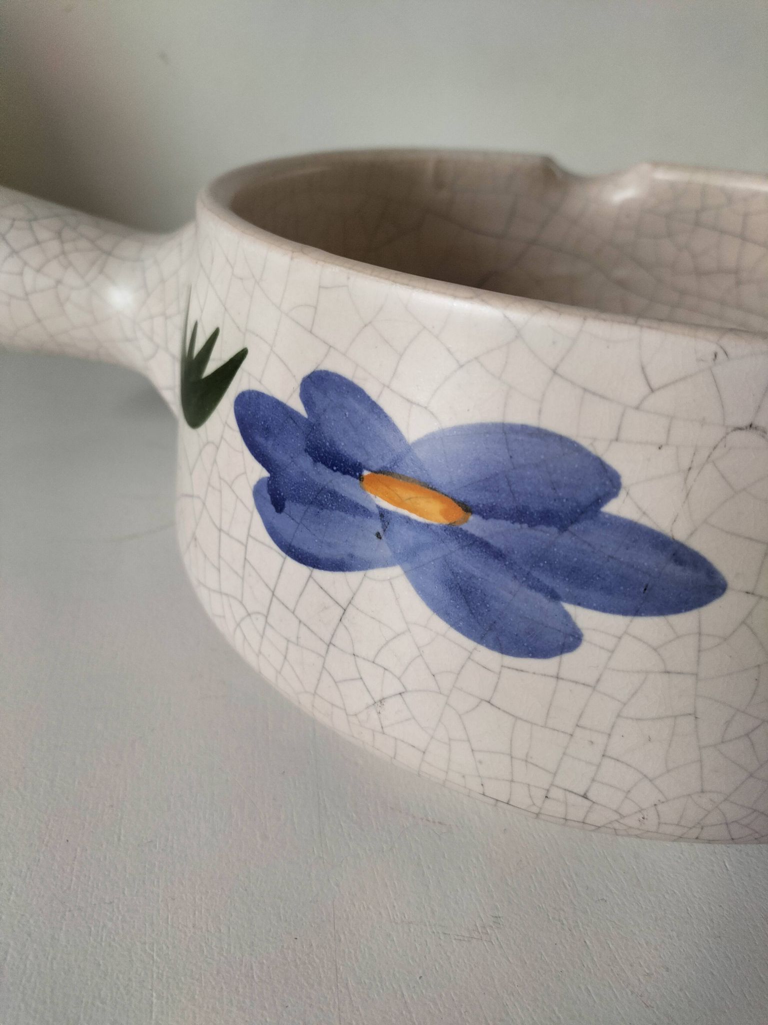 Large antique crackled ceramic fondue pot decorated with blue flowers