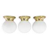 Ensemble de trois plafonniers milieu de siècle en laiton et verre de lait, restaurés