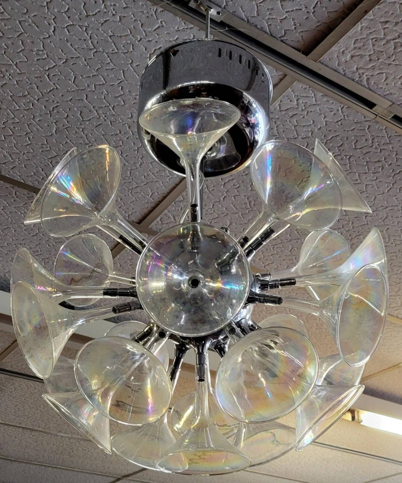 According to Goffredo Reggiani: trumpet chandelier or champagne flute