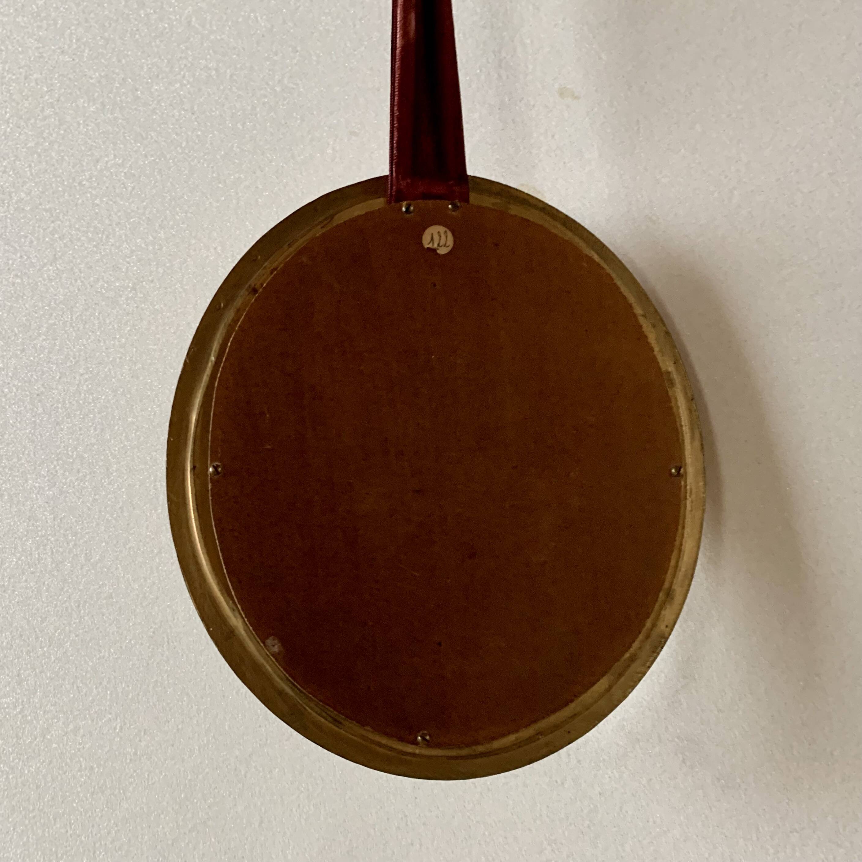 Small vintage wall mirror in gold painted wood