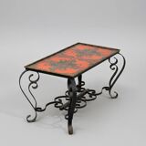 Vintage coffee table in glazed ceramic and wrought iron.