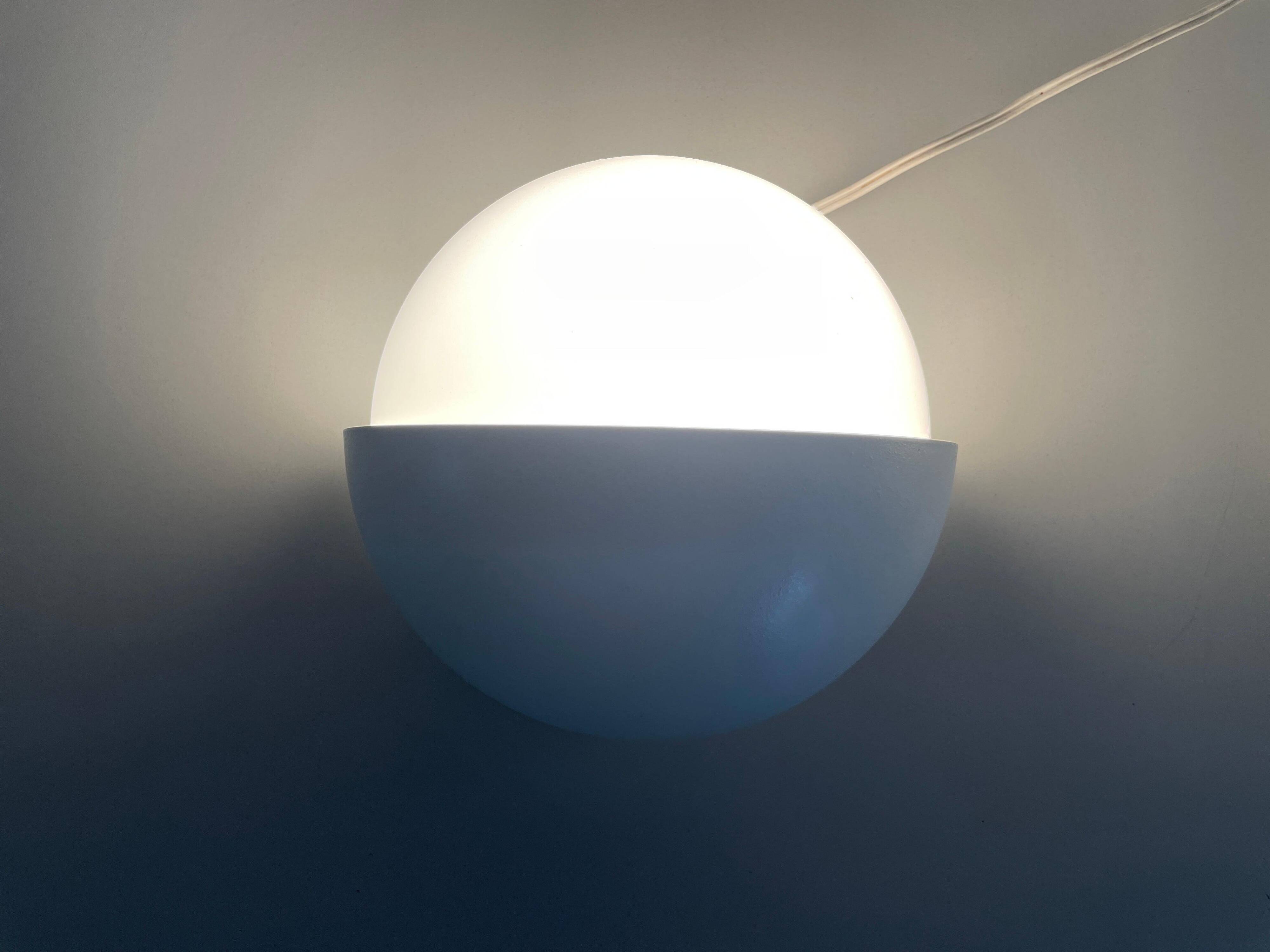 Round wall lights, small and large, in white metal by Bega, 1970s, Germany.