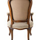 Louis XV style carved wooden armchair with floral needlepoint upholste