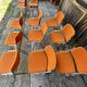 Sérié 39 chaises 4 fauteuils DSC 106 en tissu orange par Giancarlo Piretti pour Castelli