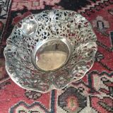 Silver metal basket with floral decoration