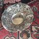 Silver metal basket with floral decoration
