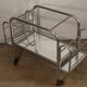 Vintage 1970s rolling dessert trolley in chrome metal and mirrored glass.