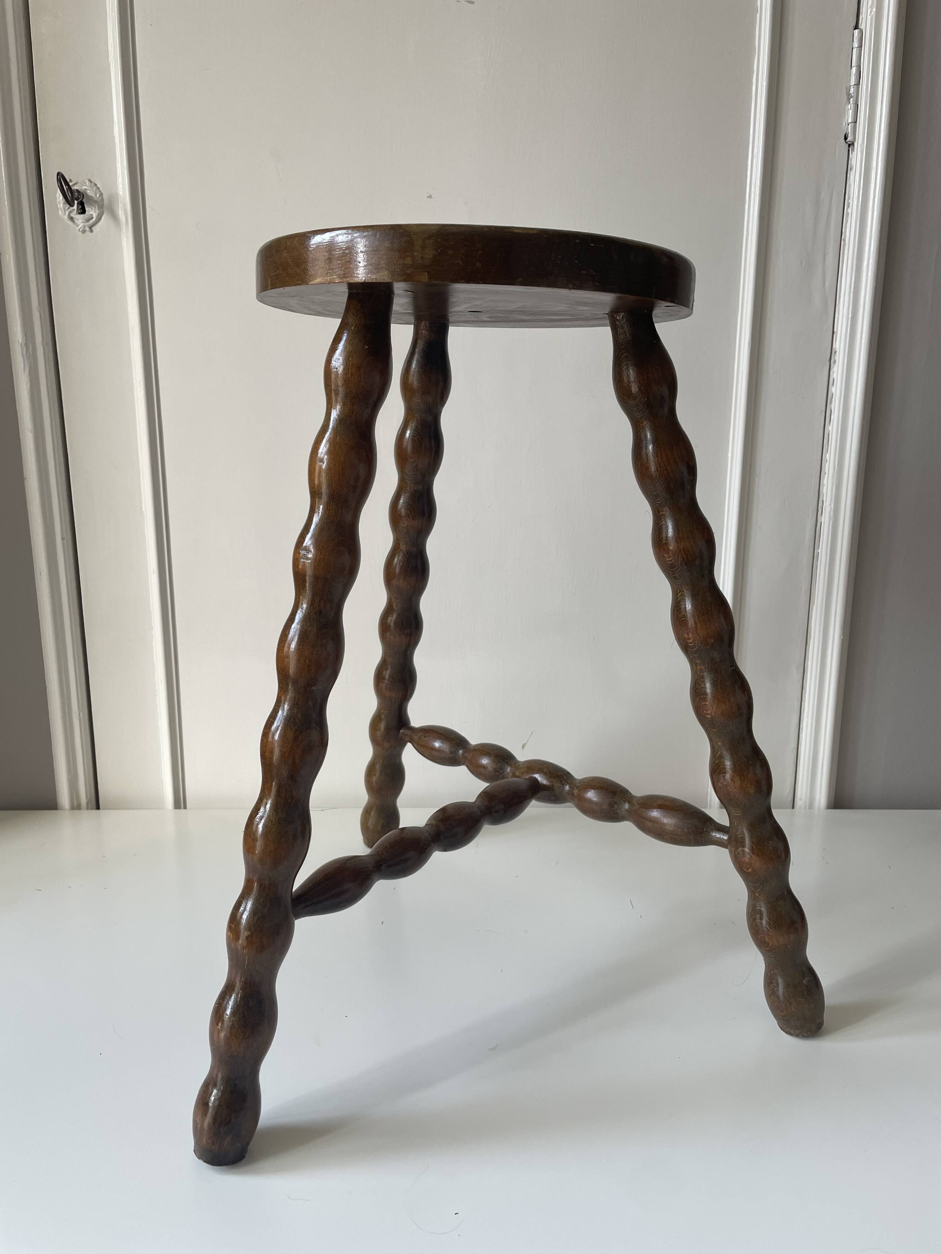 Wooden tripod stool