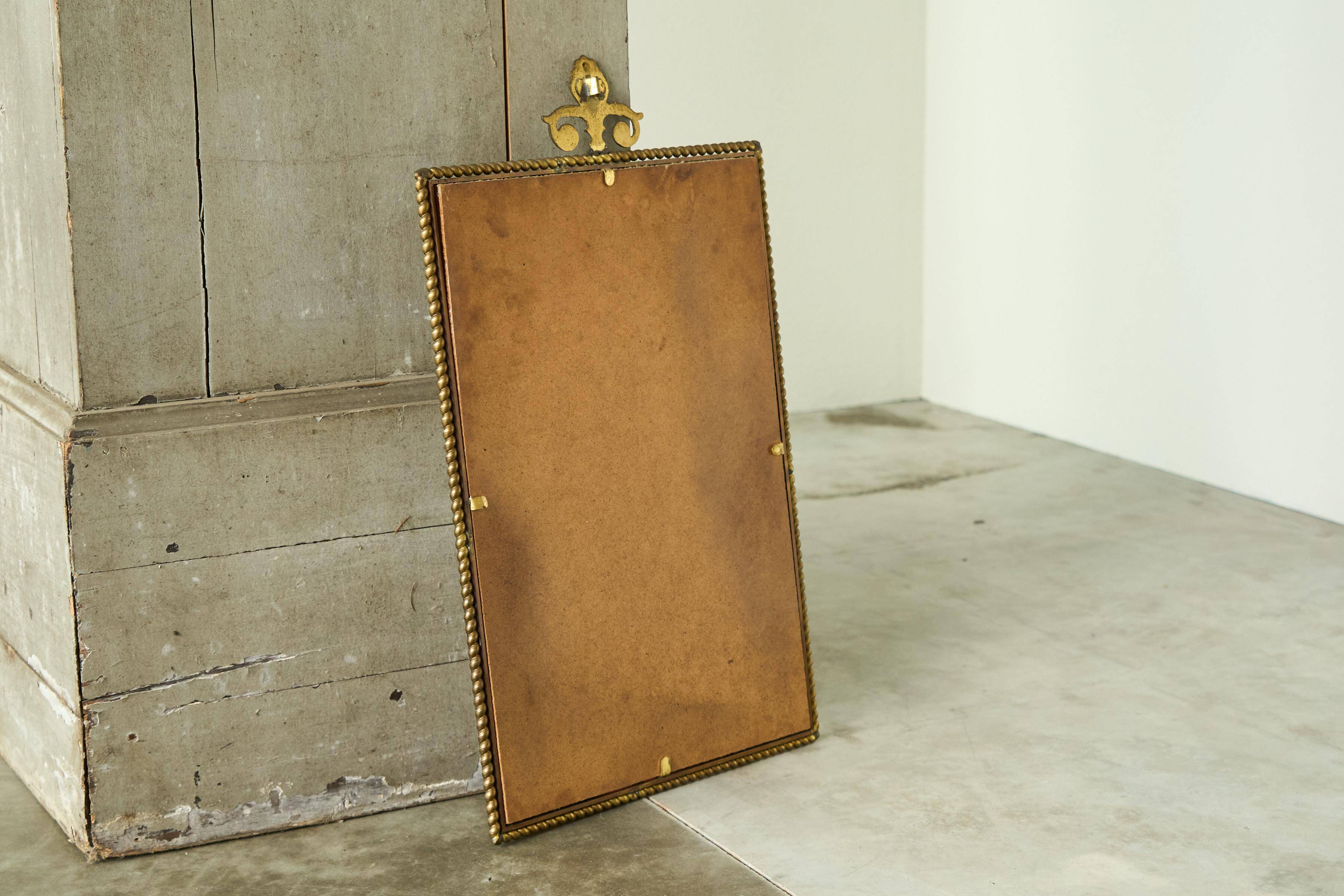 Louis XVI neoclassical mirror in patinated brass, 1960s