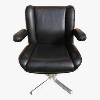 Vintage swivel black leather armchair