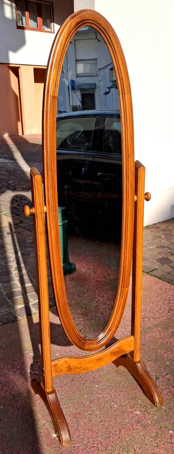 Adjustable full-length mirror for dressing room.