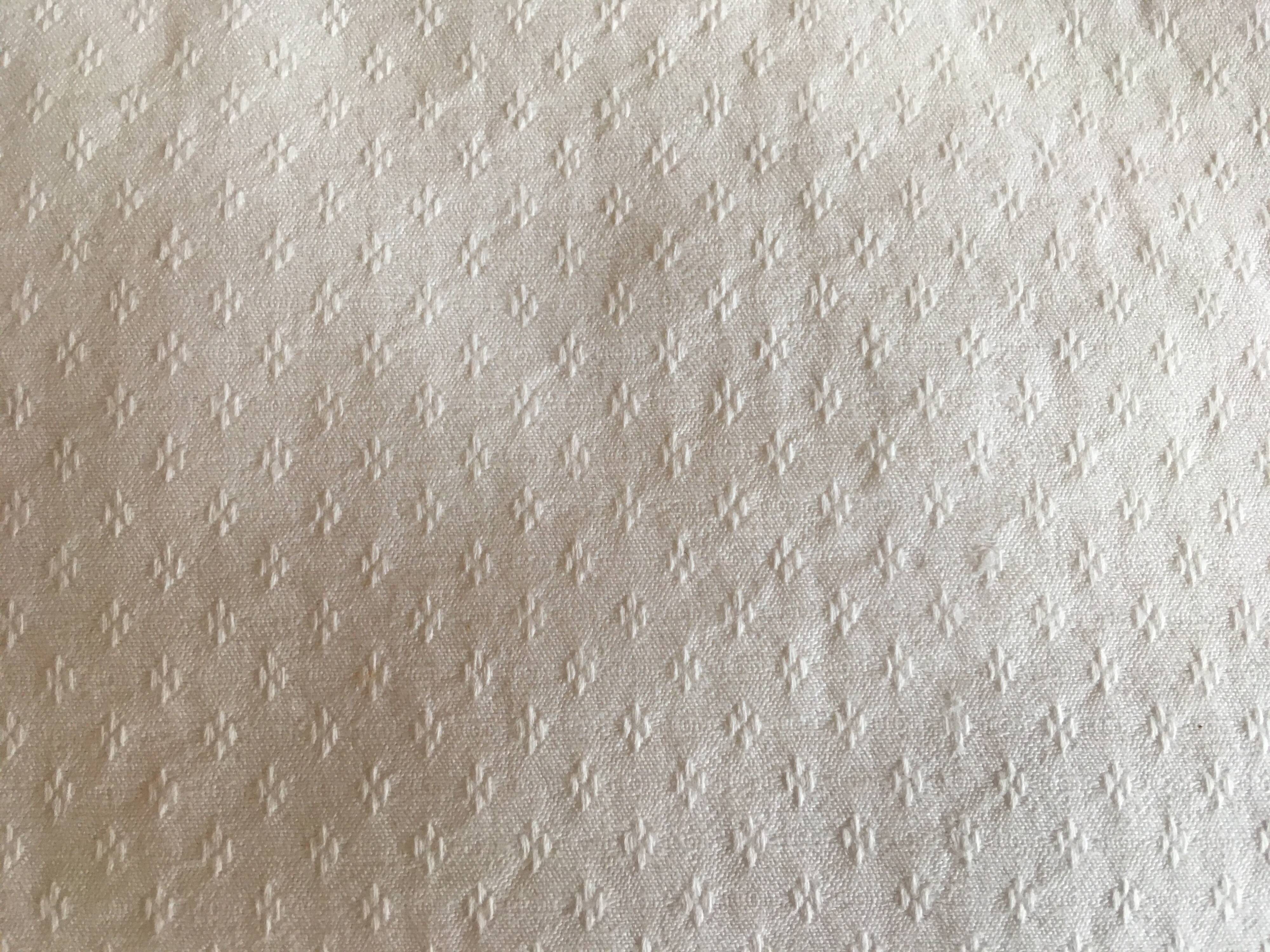 A handmade lace cushion cover