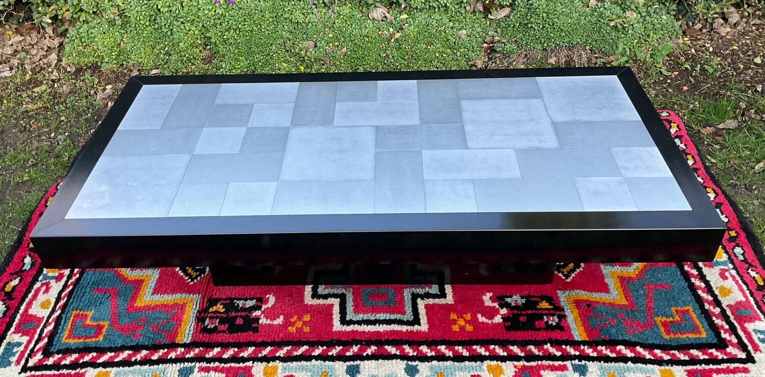 Vintage coffee table in stainless steel and black lacquered wood.