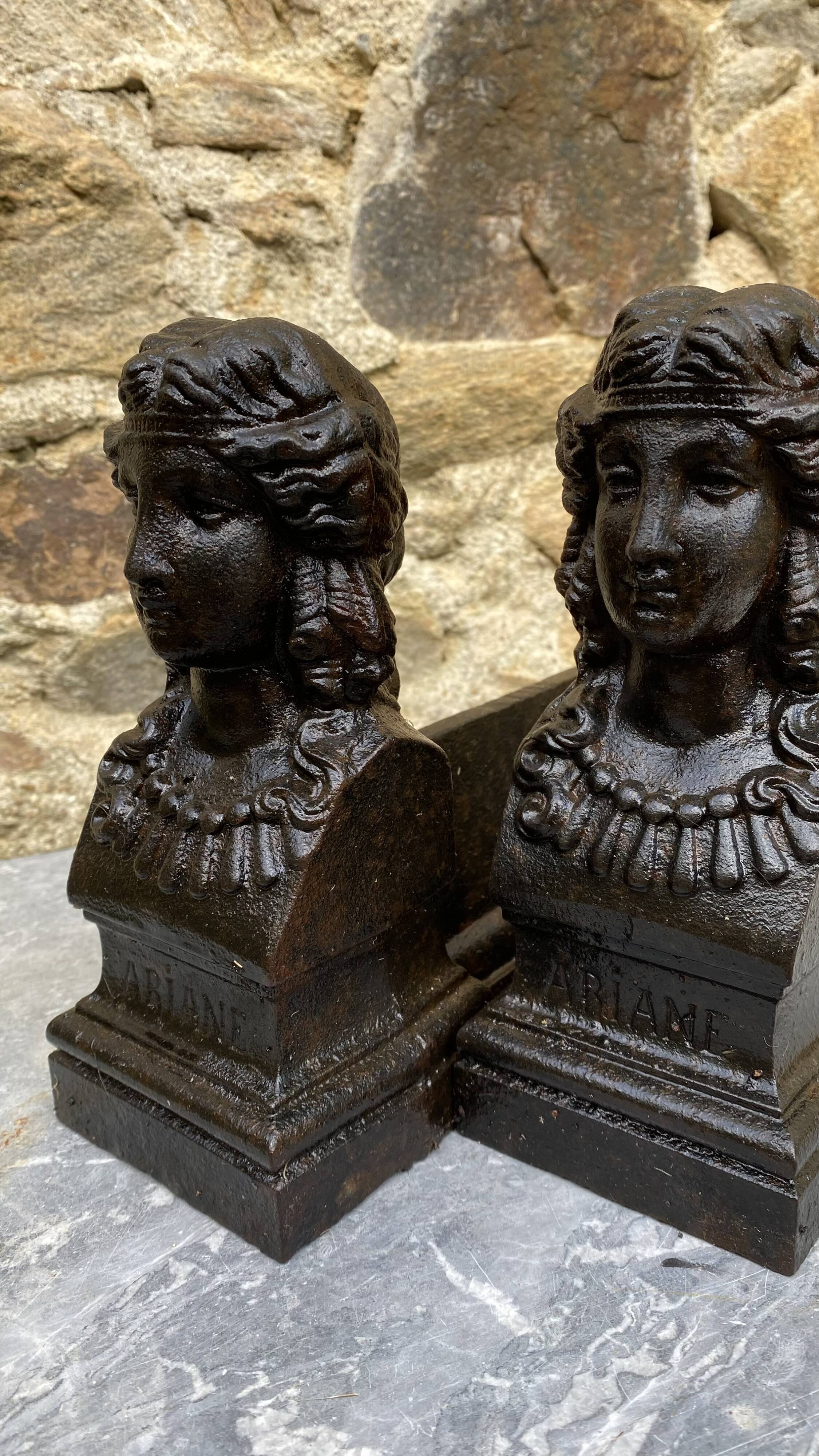 Pair of antique cast iron fire dogs "Ariadne"