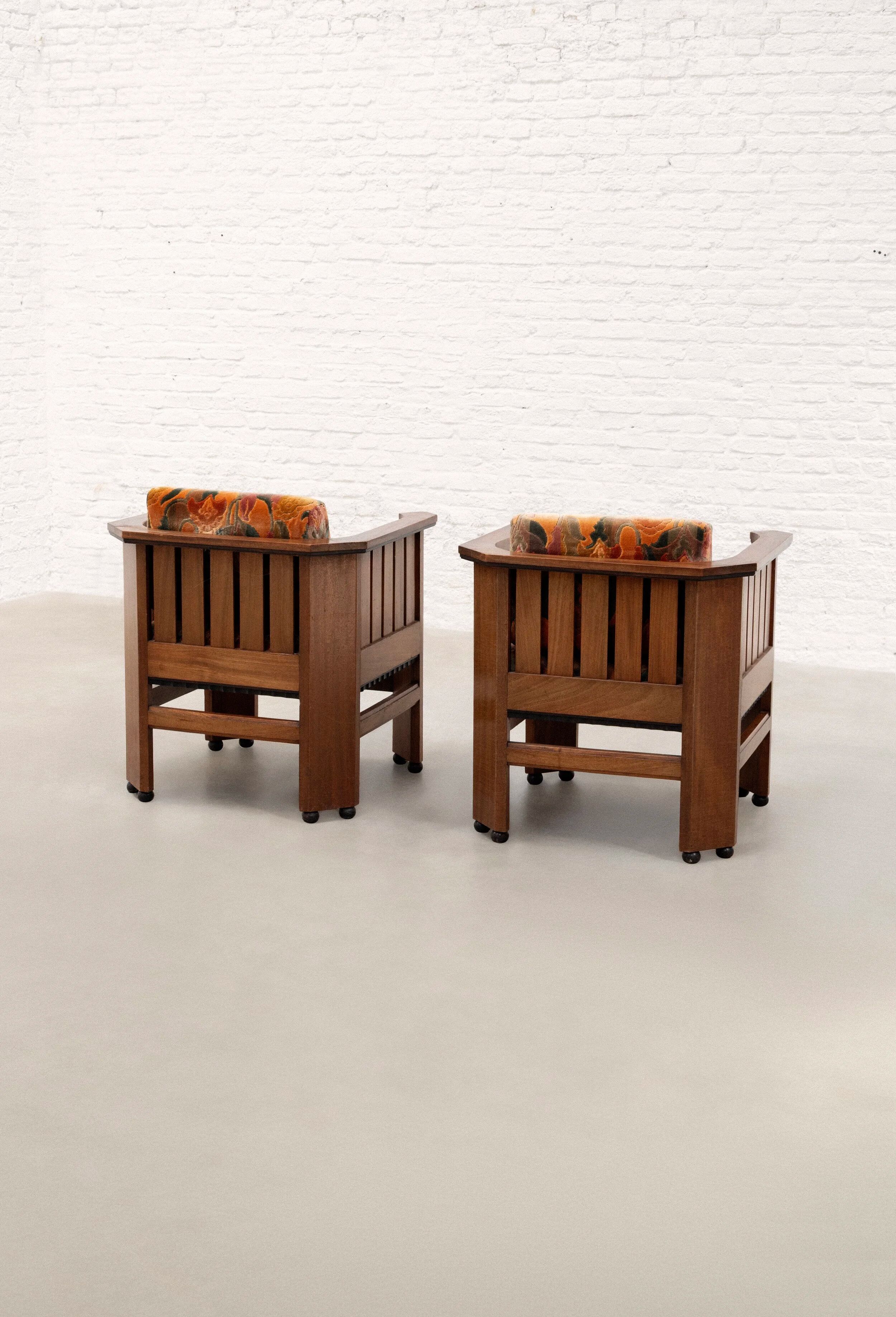 Pair of Amsterdam School walnut armchairs, Netherlands, c. 1930