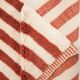 A handmade Moroccan striped terracotta rug, 150/250cm