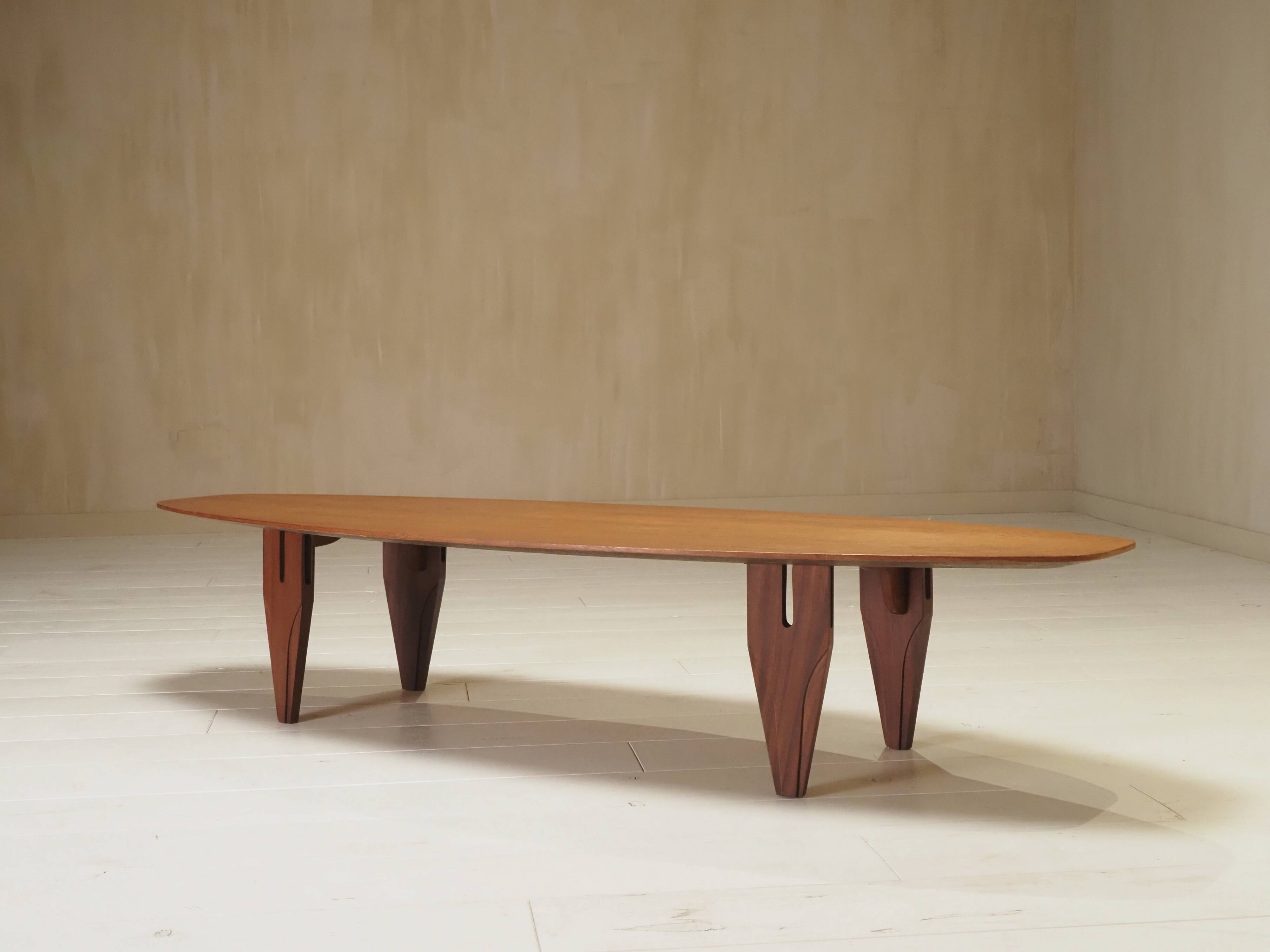 Danish coffee table in the shape of a surfboard from the 1960s.