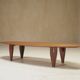 Danish coffee table in the shape of a surfboard from the 1960s.