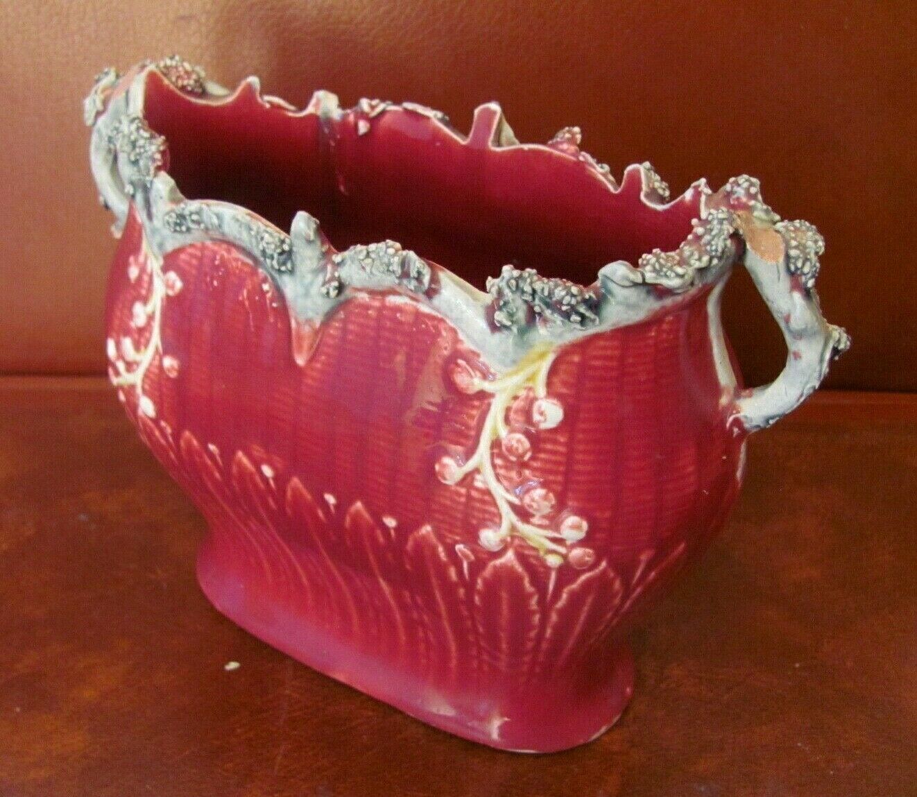 Garden cover in red slurry decorated with flower buds