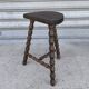Turned wooden tripod stool