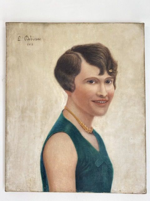 Portrait of a woman, signed Debiesse dated 1928