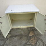 Old storage furniture in sheet metal and enamelled sheet metal