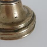 Vintage push candle holder