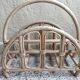 Refurbished rattan magazine rack