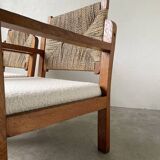 Pair of oak and straw armchairs, reconstruction style