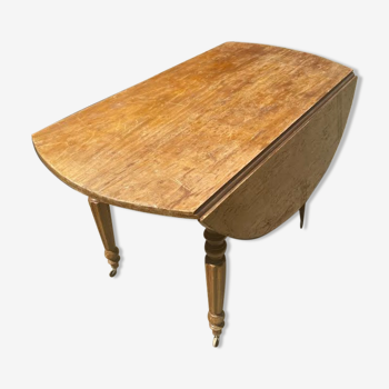 Wooden table on casters