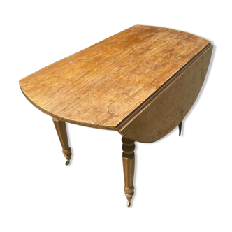 Wooden table on casters