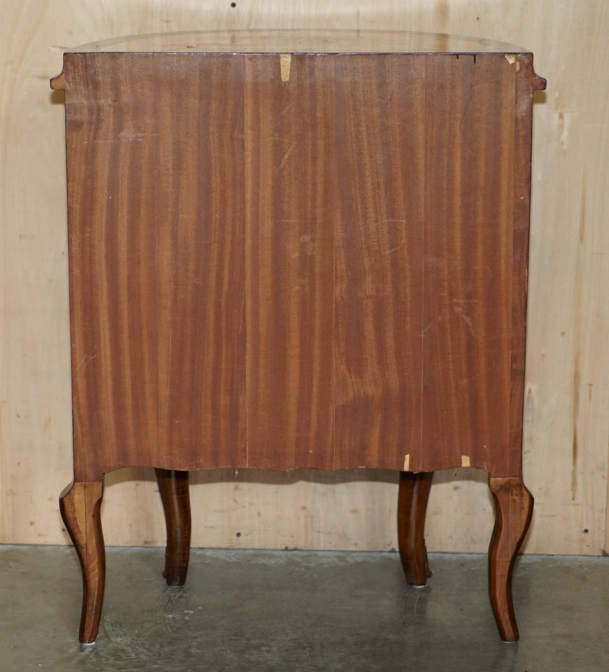 Vintage 1940s demi-lune buffet in burr walnut and satin wood.