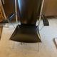 Metal armchair and black skaï