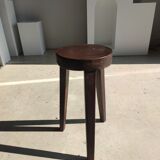 Small high tripod stool in brown solid wood