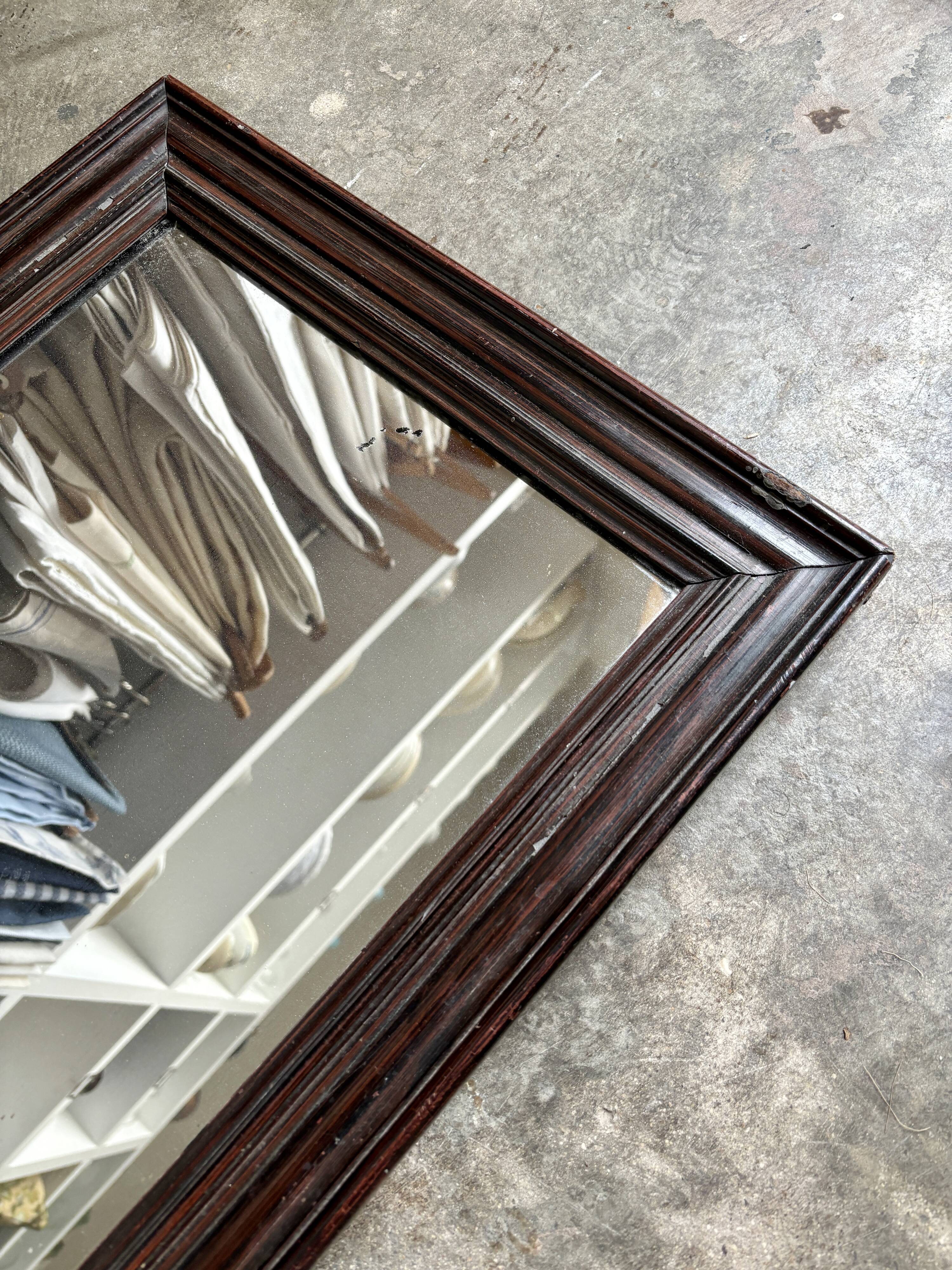 Dark wooden mirror ☐ 49.5 x 40 cm