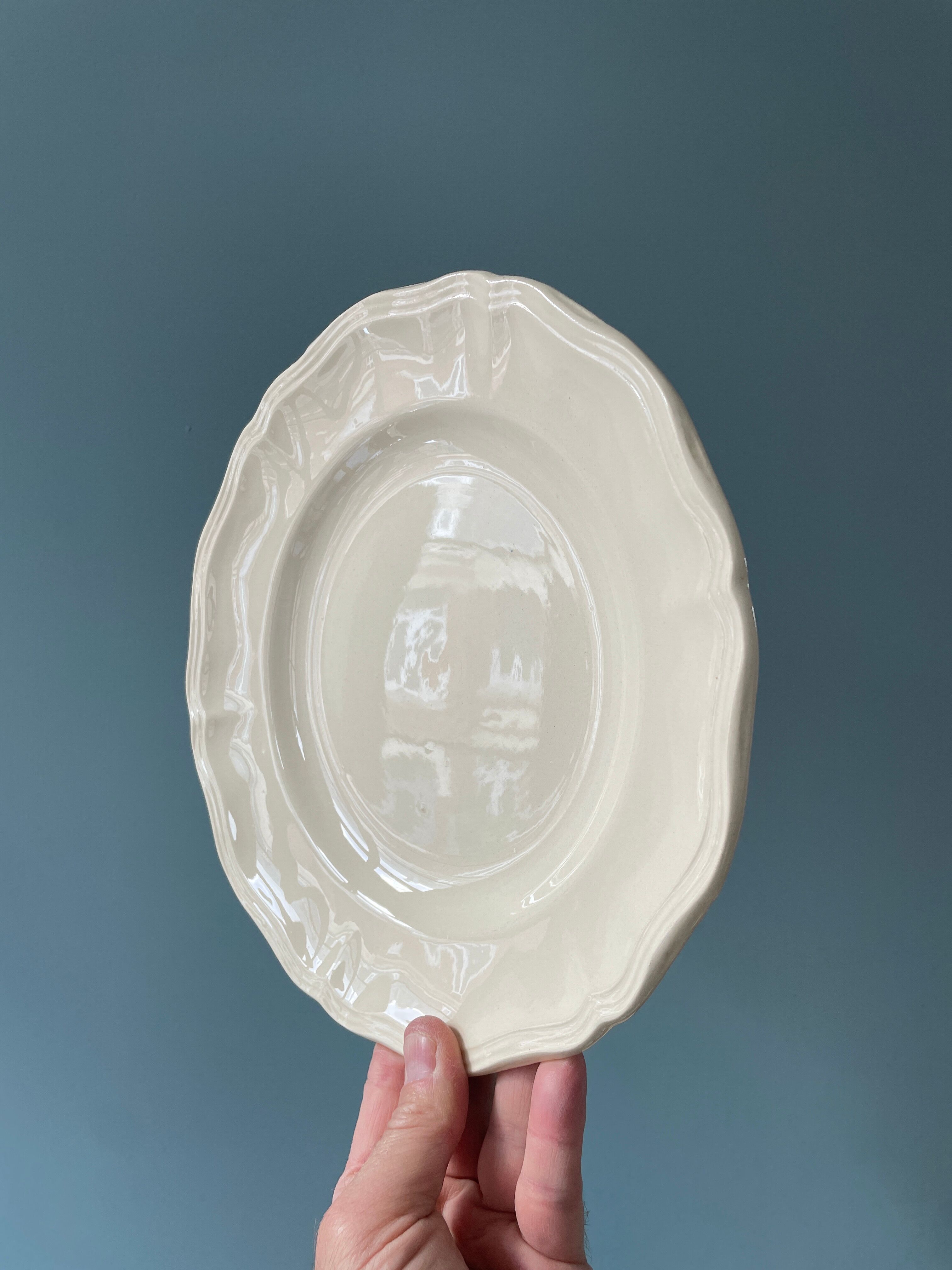 Set of 11 flat earthenware plates from Sarreguemines France