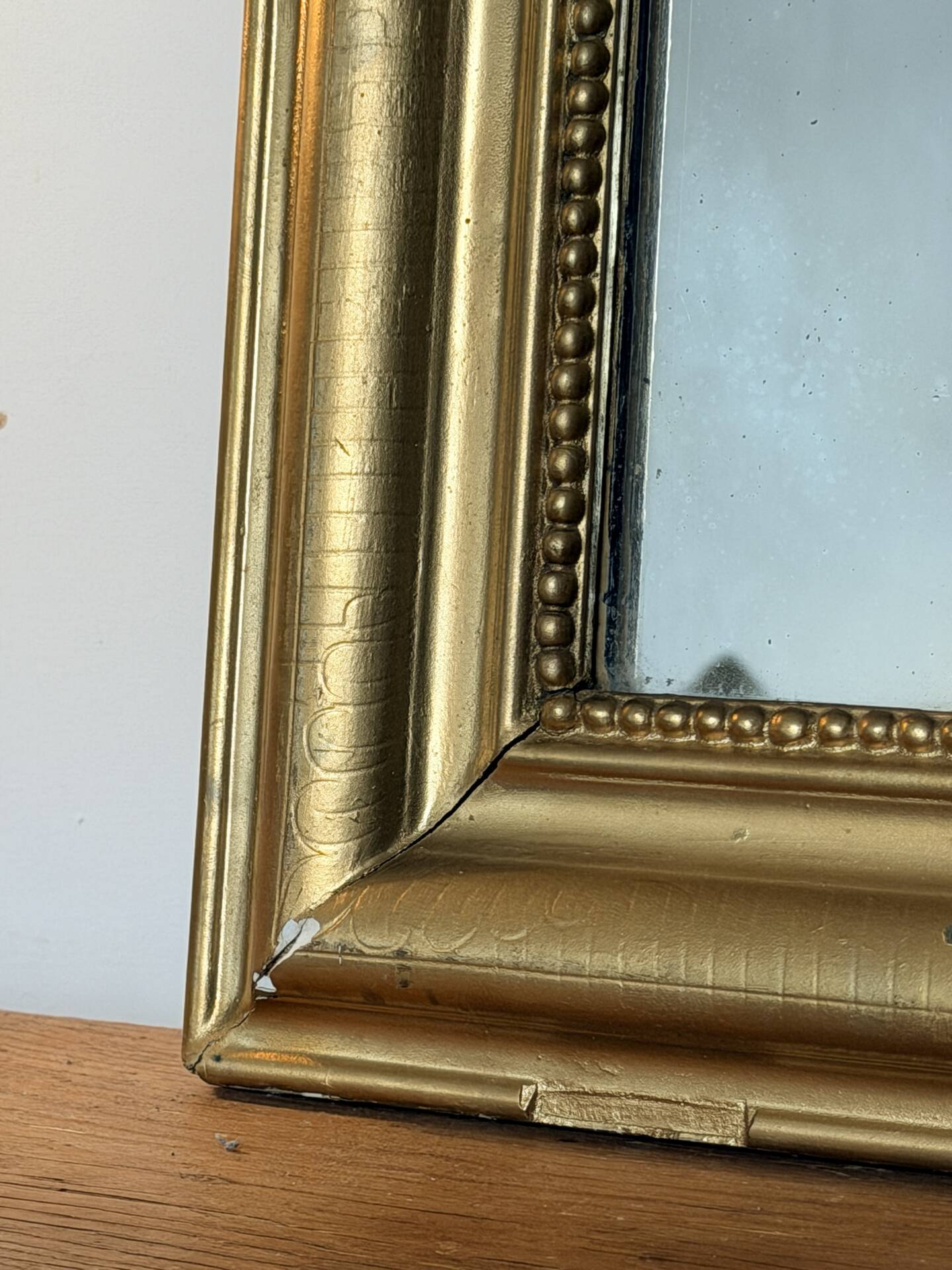 Small Louis-Philippe gilded mirror with mercury glass 48x60cm