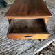 Antique Louis Philippe style farm table in solid cherry wood with turned base.