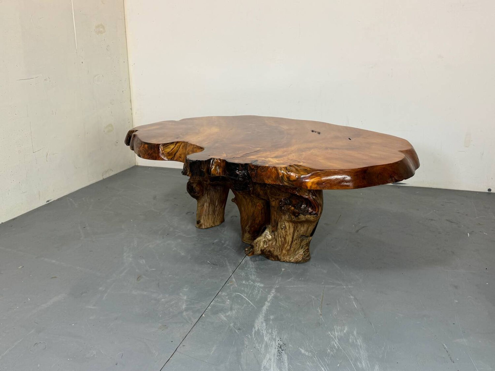 Brutalist Wabi Sabi mid-century coffee table made of natural biological burl wood.
