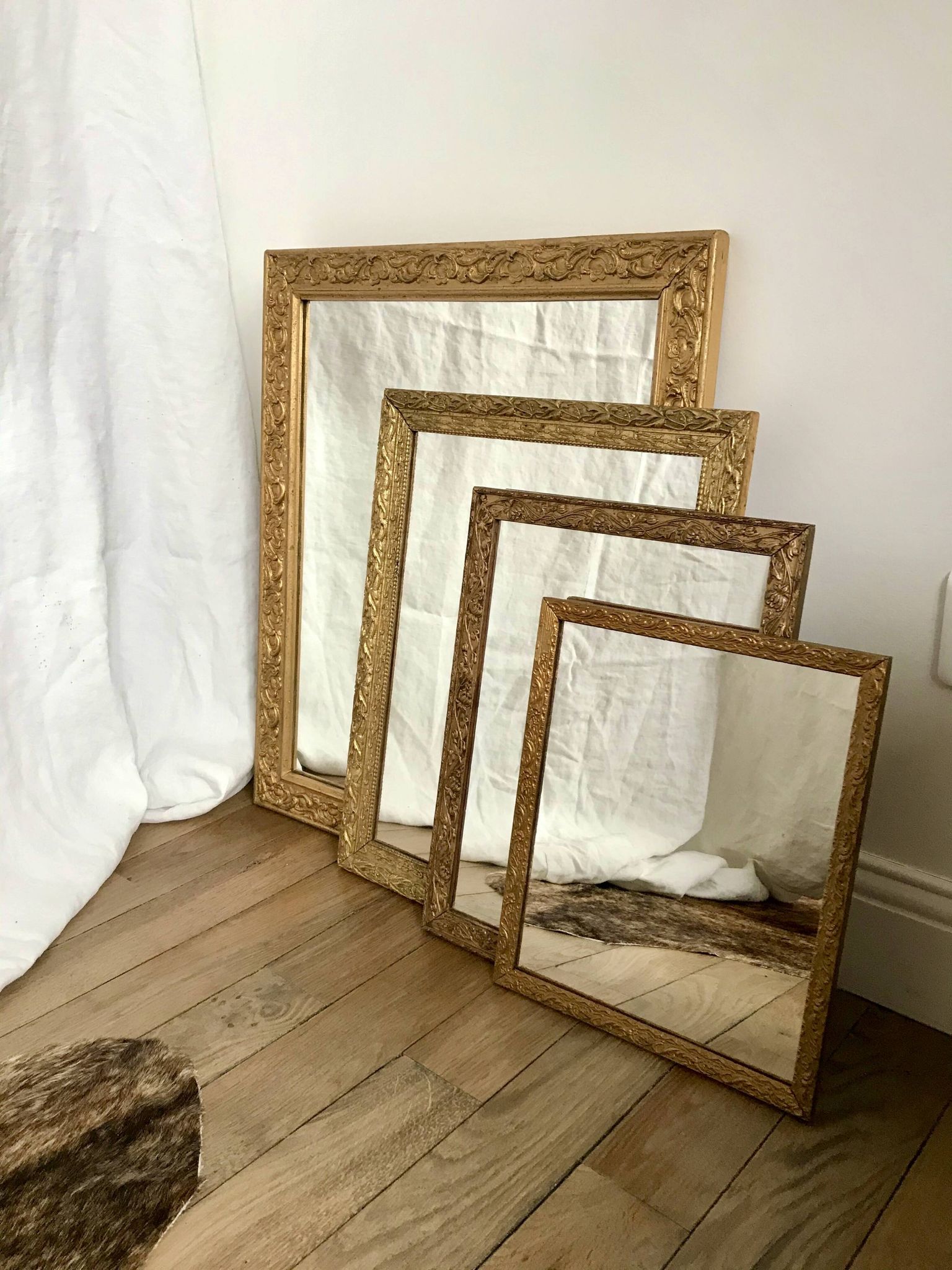 set of 4 mirrors in wood and gilded stucco early 20th century