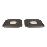 A set of classic Danish candlesticks in polished metal.